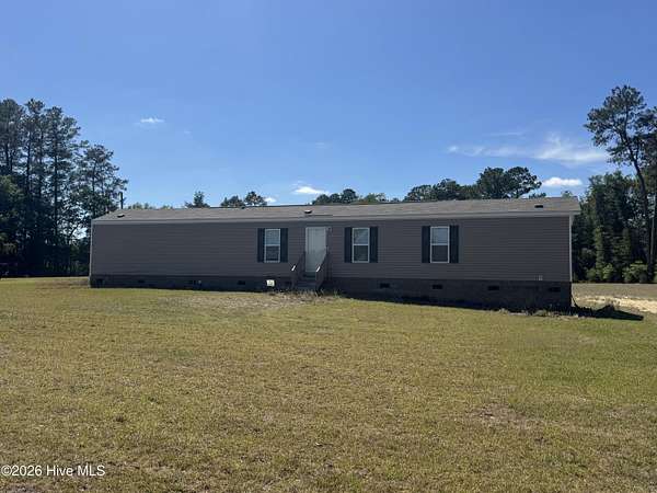 2 Acres of Land with Home for Sale in Evergreen, North Carolina