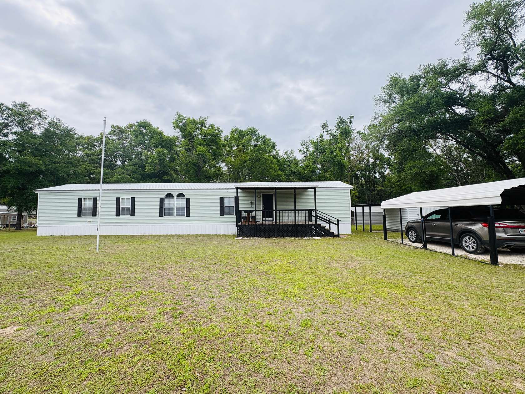 5 Acres of Land with Home for Sale in O'Brien, Florida