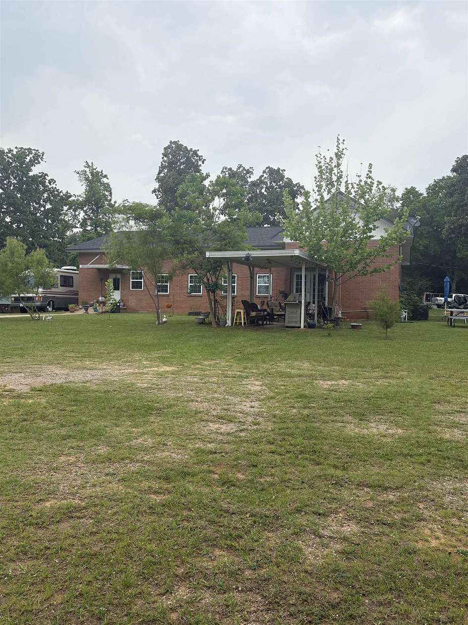 1.66 Acres of Land with Home for Sale in Gilmer, Texas