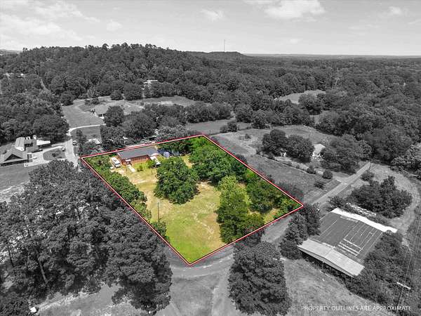 1.66 Acres of Land with Home for Sale in Gilmer, Texas