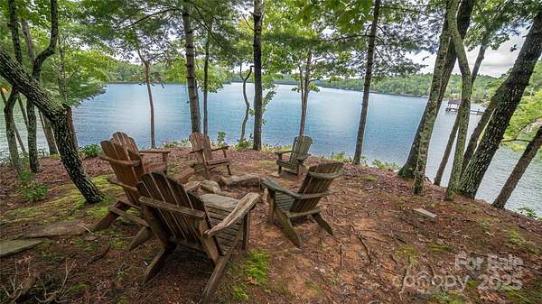 9.86 Acres of Land with Home for Sale in Marion, North Carolina