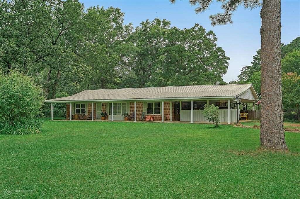 14.6 Acres of Land with Home for Sale in Oil City, Louisiana