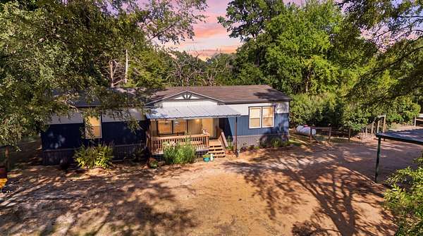 10.3 Acres of Land with Home for Sale in Whitesboro, Texas