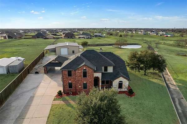 1.65 Acres of Land with Home for Lease in Royse City, Texas