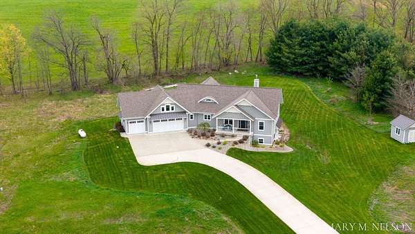 5.2 Acres of Land with Home for Sale in Rockford, Michigan