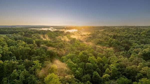 297 Acres of Recreational Land with Home for Sale in Long Lane, Missouri