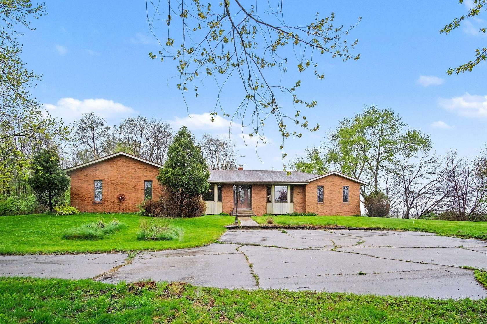 9.4 Acres of Land with Home for Sale in Coopersville, Michigan
