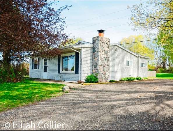 2 Acres of Land with Home for Sale in Rockford, Michigan