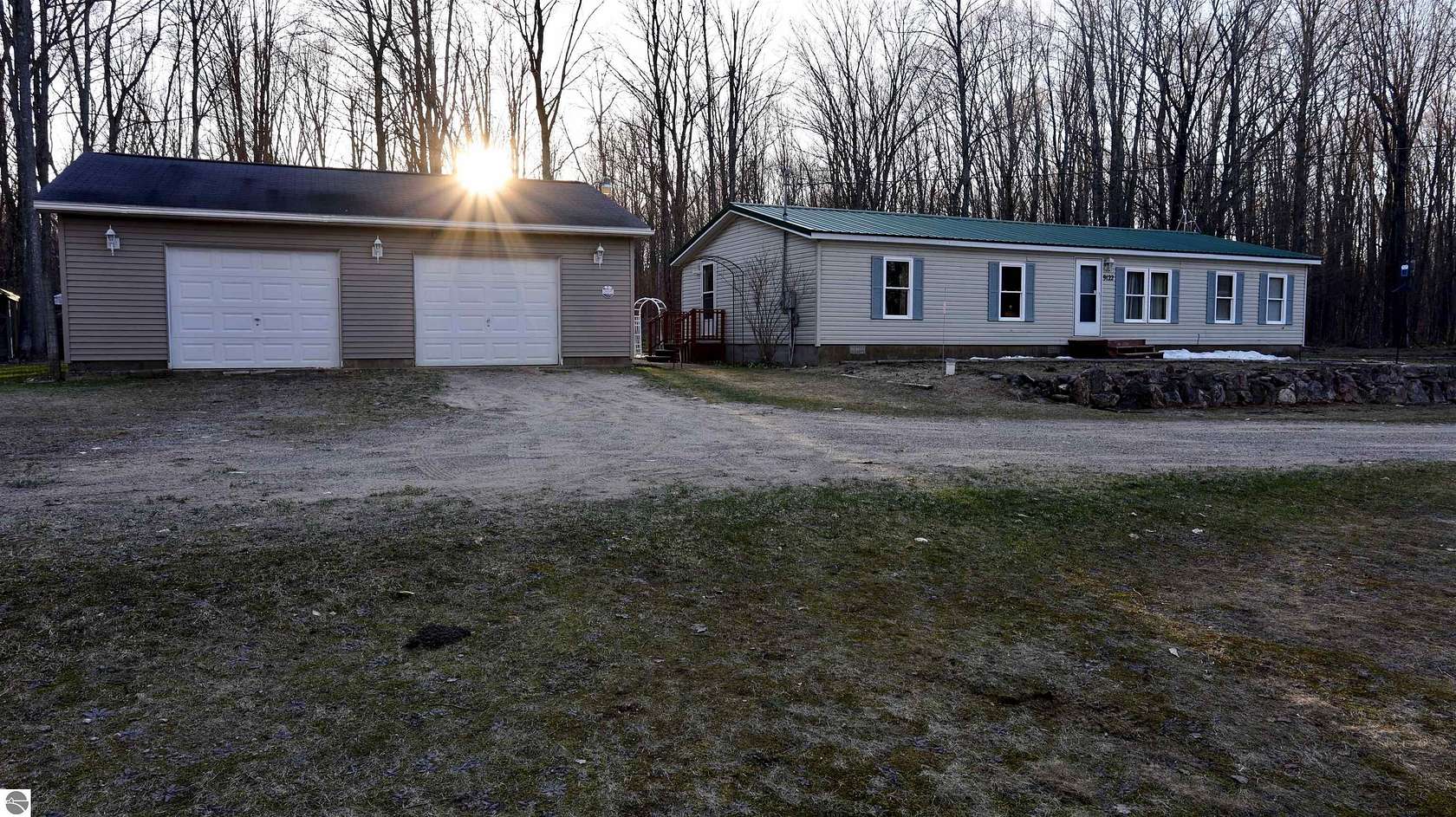 9.88 Acres of Land with Home for Sale in Mancelona, Michigan