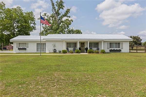 9.29 Acres of Land with Home for Sale in Grand Bay, Alabama