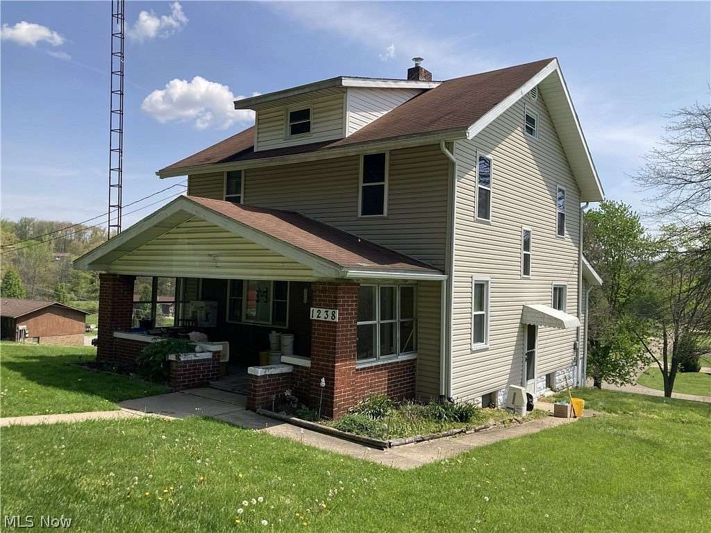 2.12 Acres of Land with Home for Auction in Dover, Ohio