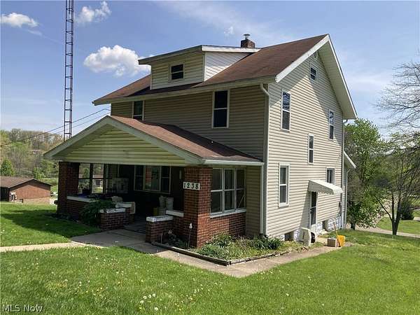 2.12 Acres of Land with Home for Auction in Dover, Ohio