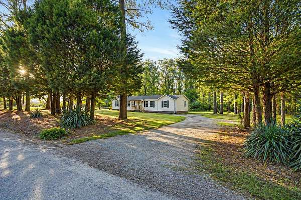 9.2 Acres of Land with Home for Sale in Jamestown, South Carolina