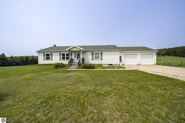 14.3 Acres of Land with Home for Sale in Bellaire, Michigan