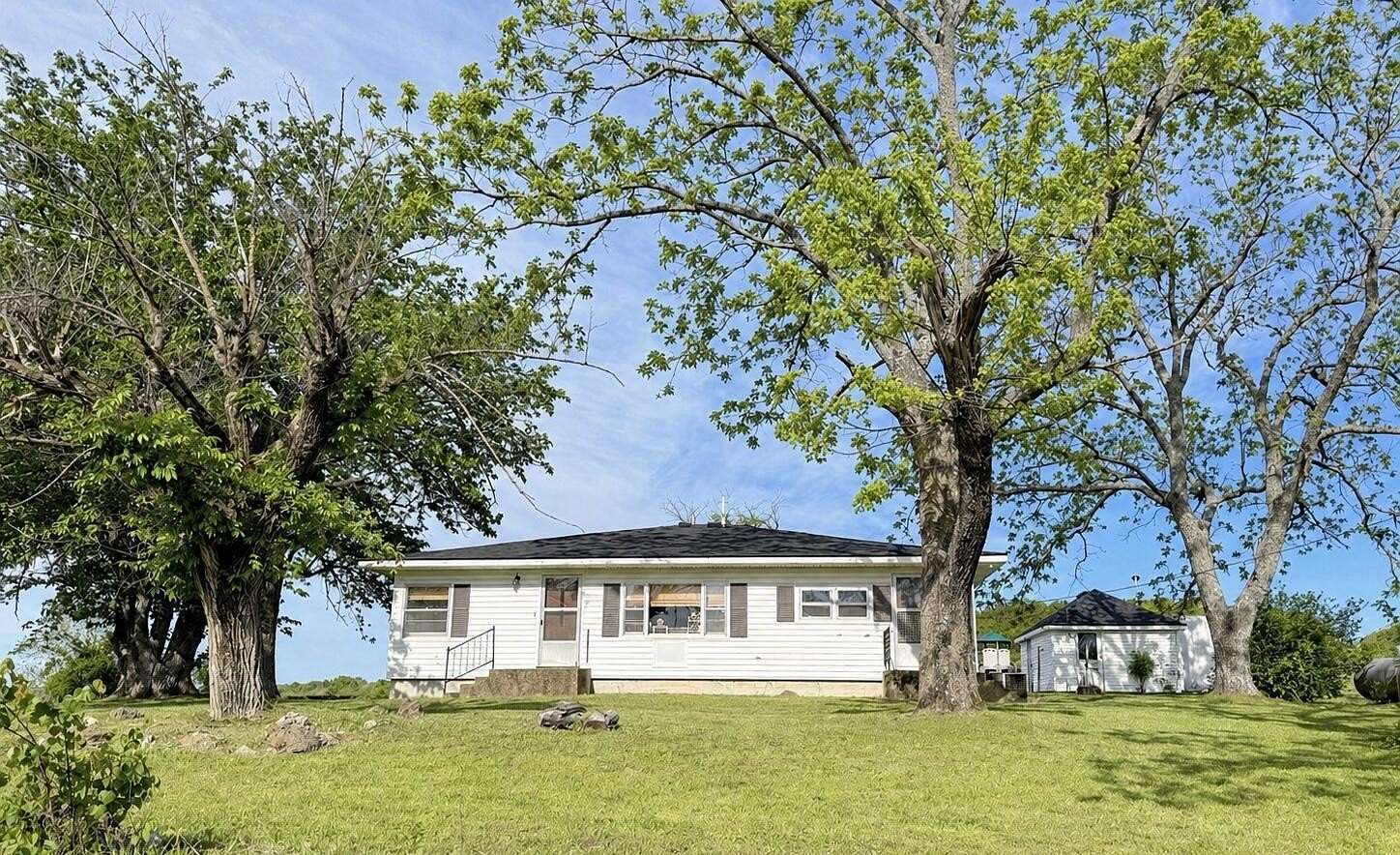 32.8 Acres of Land with Home for Sale in Mountain Grove, Missouri