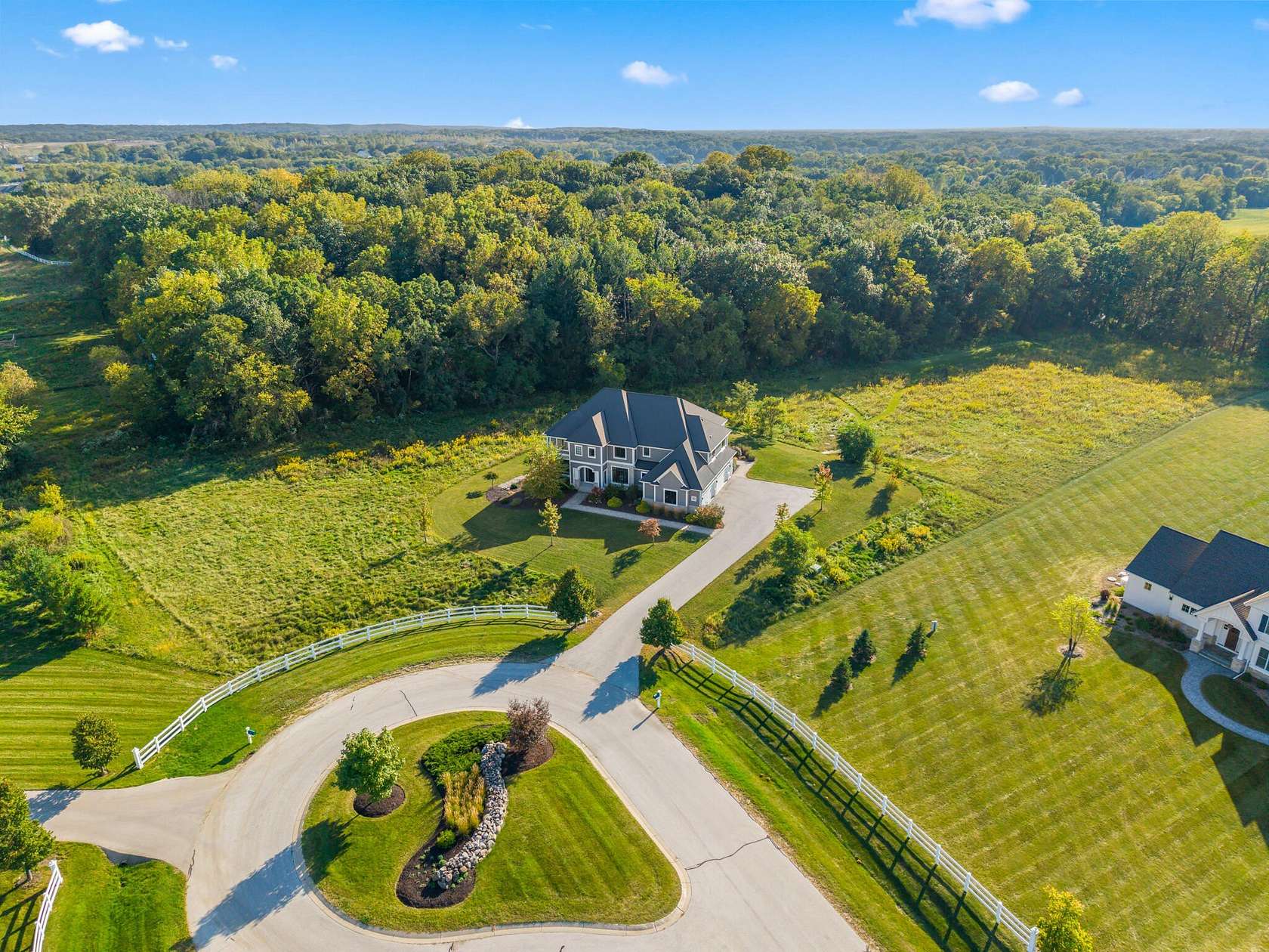 5.49 Acres of Land with Home for Sale in Oconomowoc, Wisconsin