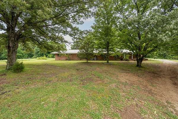 15.5 Acres of Land with Home for Sale in Lake Cormorant, Mississippi