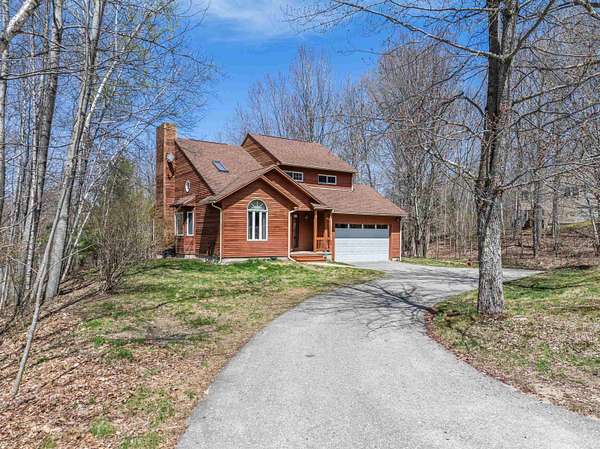1.68 Acres of Land with Home for Sale in Bristol, New Hampshire
