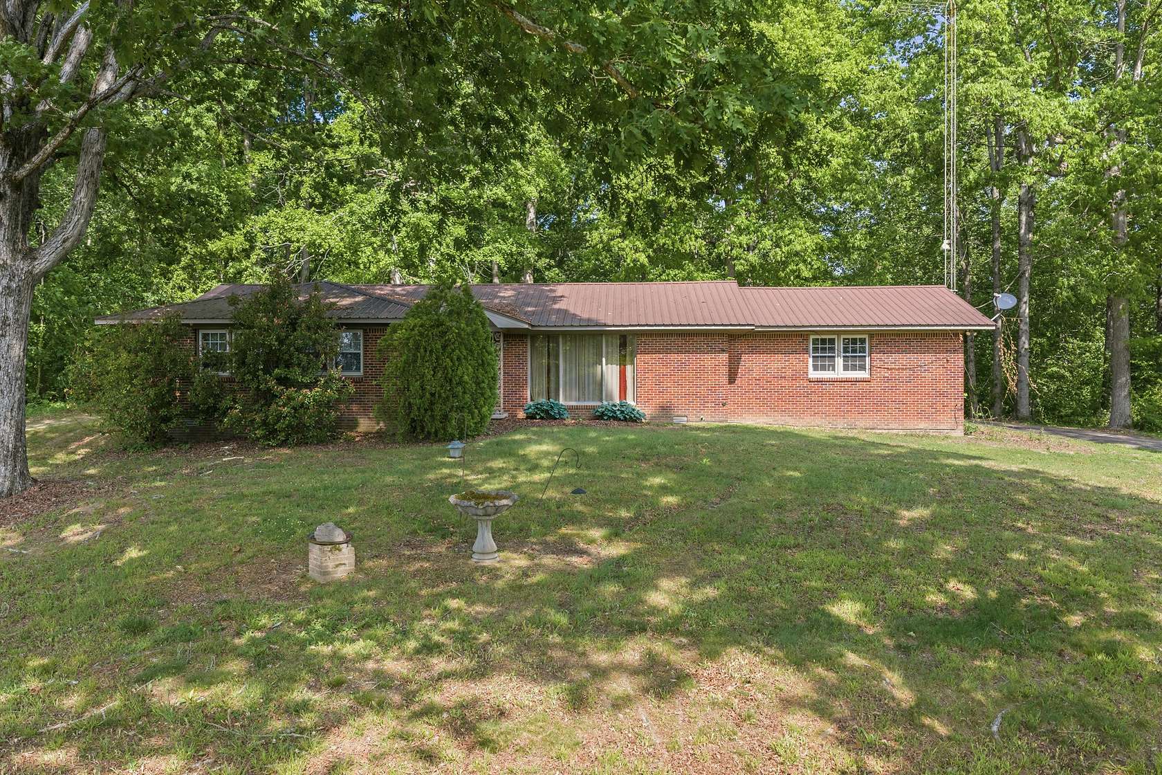 6.78 Acres of Land with Home for Sale in Decaturville, Tennessee