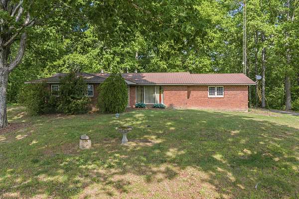 6.78 Acres of Land with Home for Sale in Decaturville, Tennessee