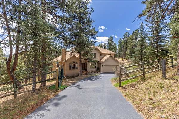 2.7 Acres of Land with Home for Sale in Evergreen, Colorado