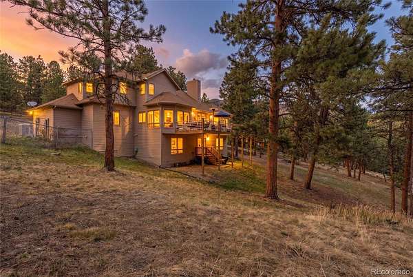 2.7 Acres of Land with Home for Sale in Evergreen, Colorado