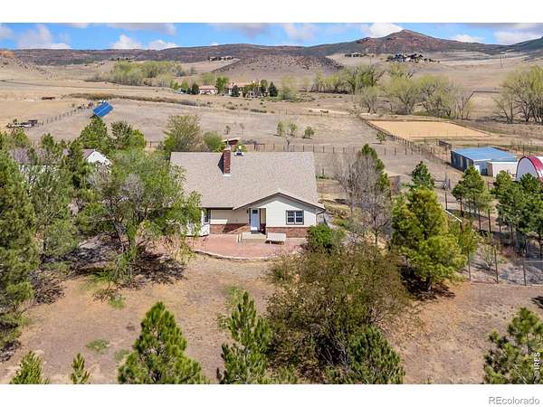 4.87 Acres of Land with Home for Sale in Loveland, Colorado