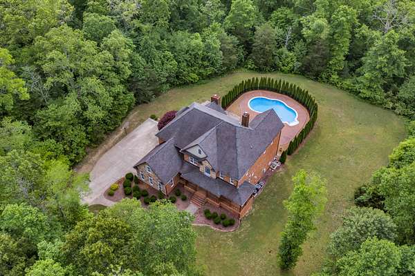 10 Acres of Land with Home for Sale in Burns, Tennessee