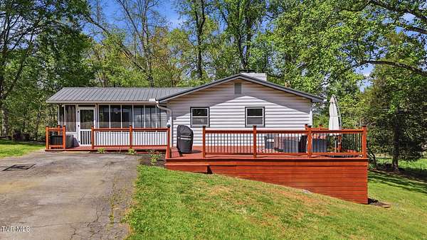 3.2 Acres of Land with Home for Sale in Piney Flats, Tennessee