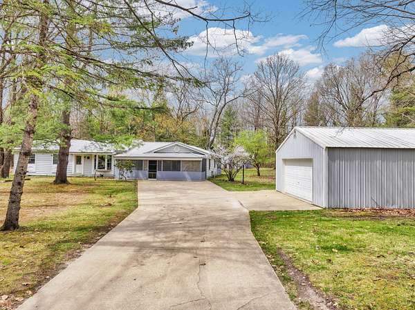 2 Acres of Land with Home for Sale in Evart, Michigan
