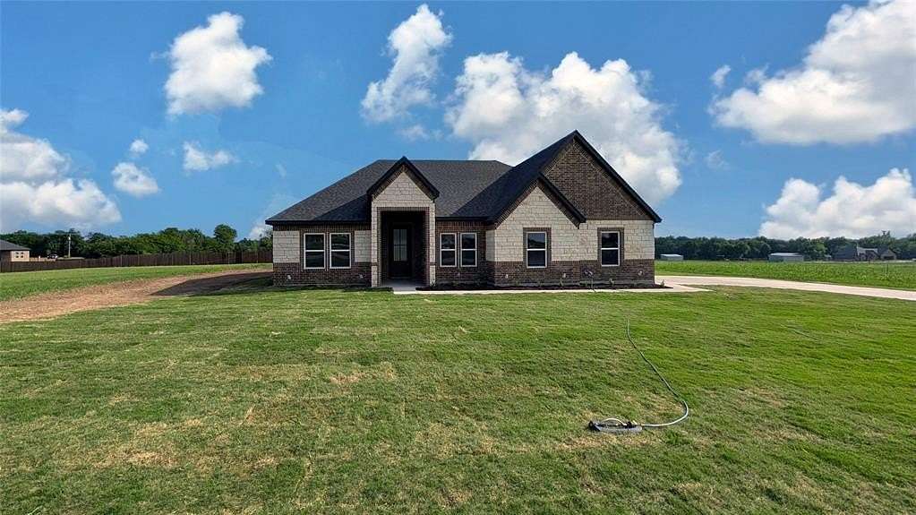 1.5 Acres of Land with Home for Sale in Greenville, Texas