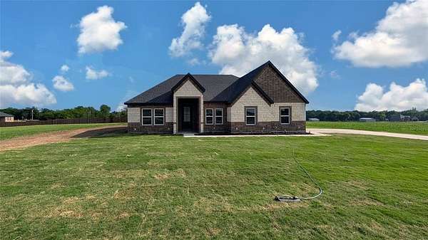 1.5 Acres of Land with Home for Sale in Greenville, Texas