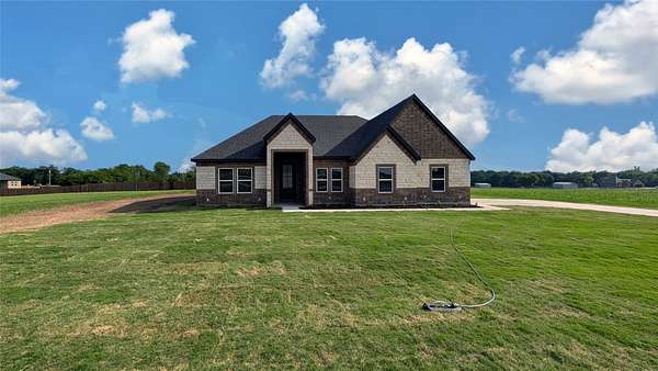 1.5 Acres of Land with Home for Sale in Greenville, Texas
