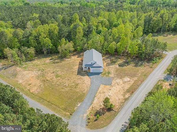 6.6 Acres of Land with Home for Sale in Bumpass, Virginia