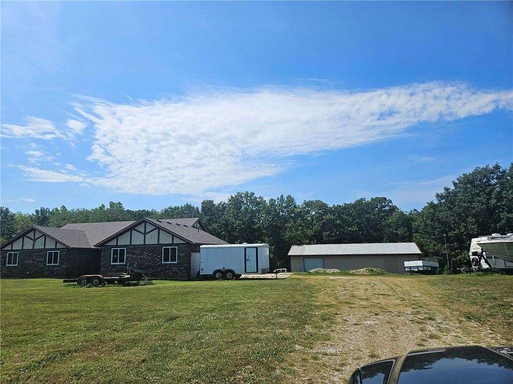 3.17 Acres of Land with Home for Sale in Excelsior Springs, Missouri