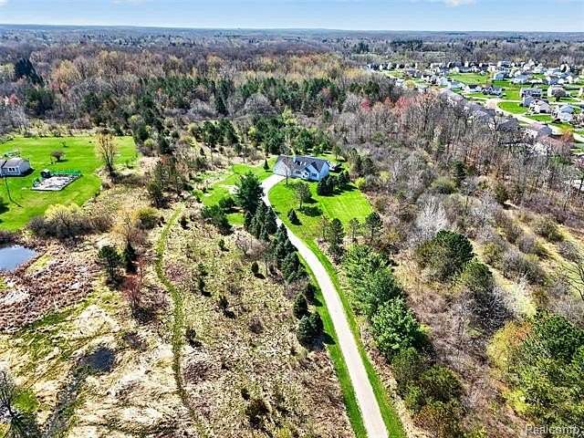 6.53 Acres of Land with Home for Sale in Mundy Township, Michigan