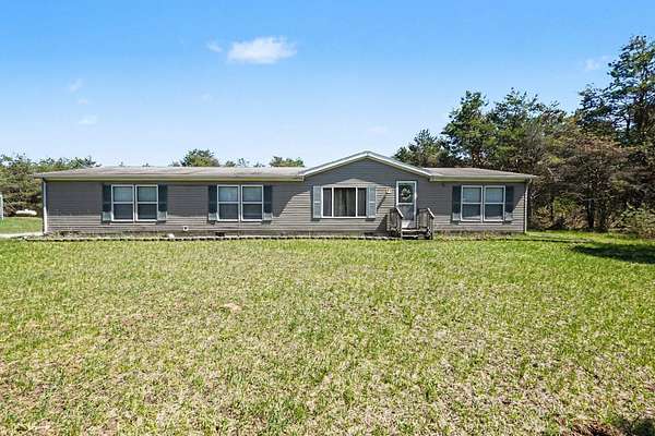 24 Acres of Land with Home for Sale in Barryton, Michigan