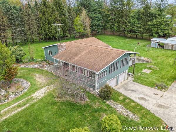 9.27 Acres of Land with Home for Sale in Portland, Michigan
