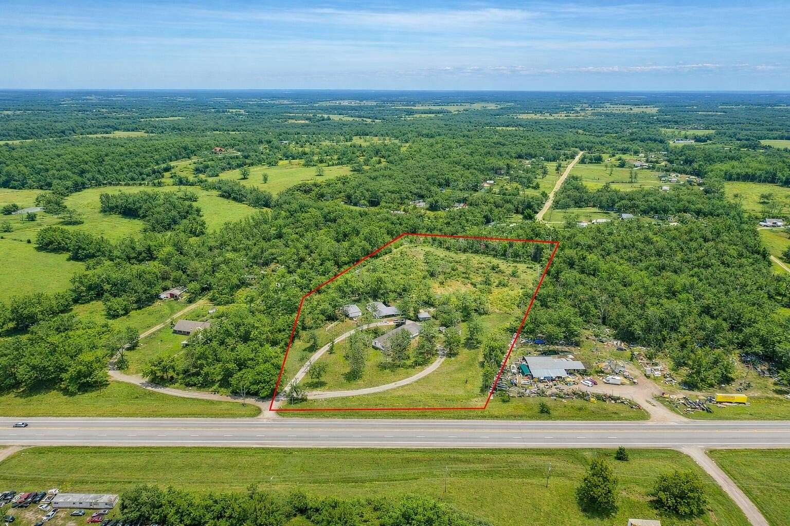 9.37 Acres of Land with Home for Sale in Lebanon, Missouri
