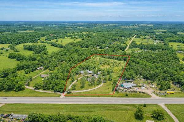 9.37 Acres of Land with Home for Sale in Lebanon, Missouri