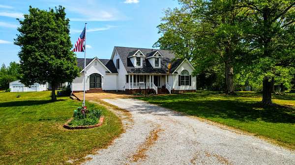 3.5 Acres of Land with Home for Sale in Holladay, Tennessee