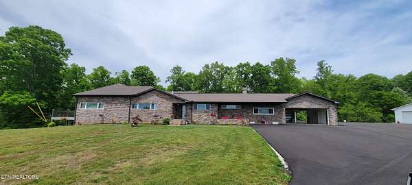 10.8 Acres of Land with Home for Sale in Clinton, Tennessee