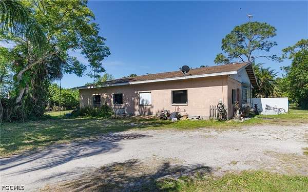 5.25 Acres of Land with Home for Sale in North Fort Myers, Florida