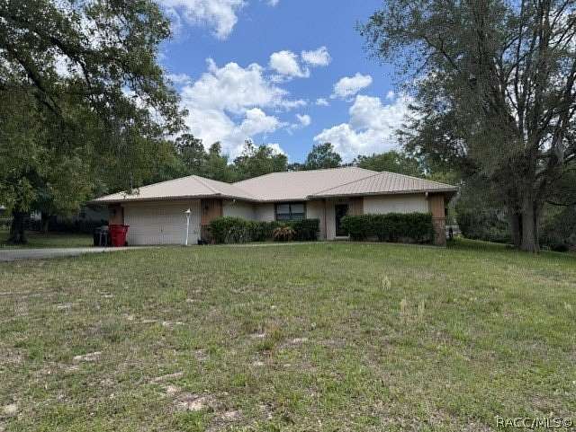 1.56 Acres of Land with Home for Sale in Inverness, Florida