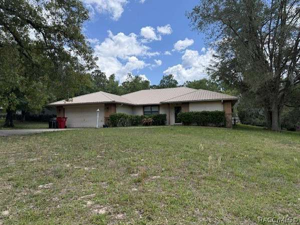 1.56 Acres of Land with Home for Sale in Inverness, Florida