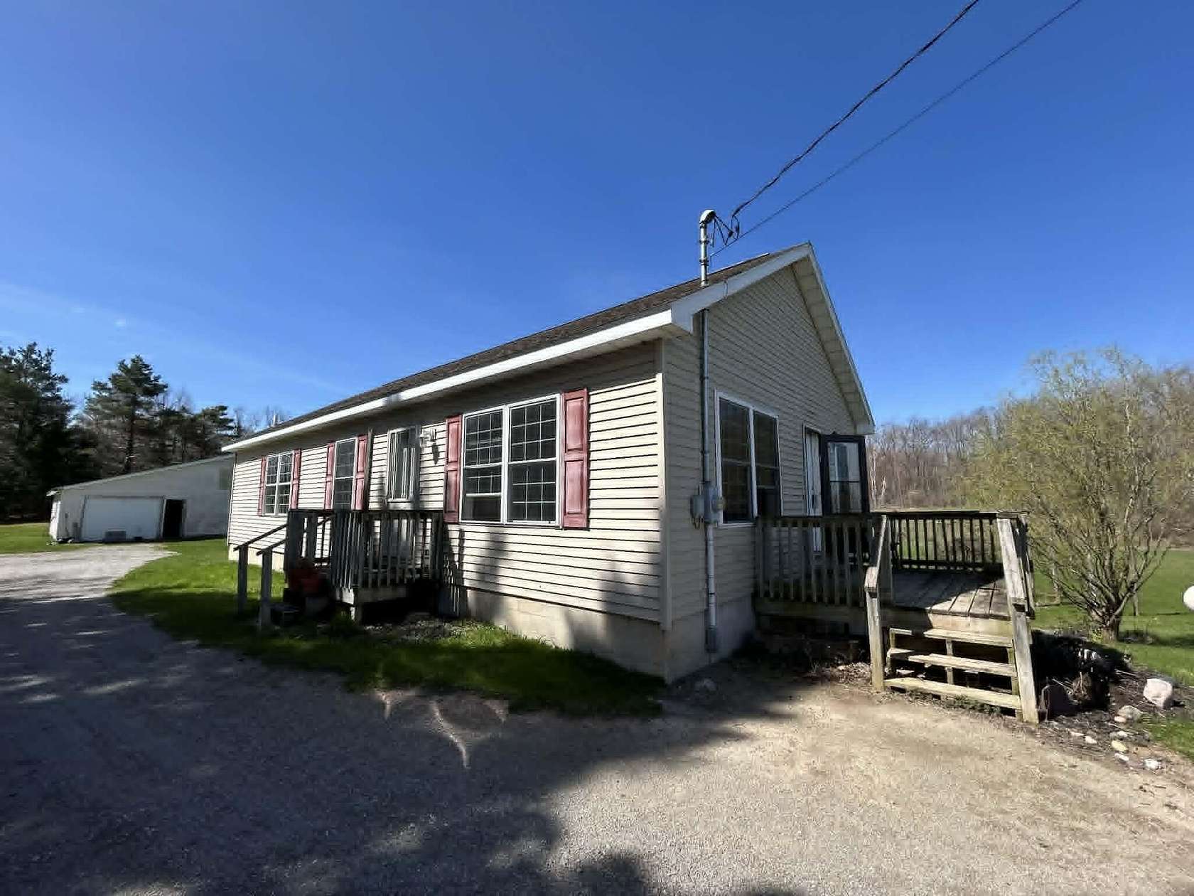 2.5 Acres of Land with Home for Sale in Curran, Michigan