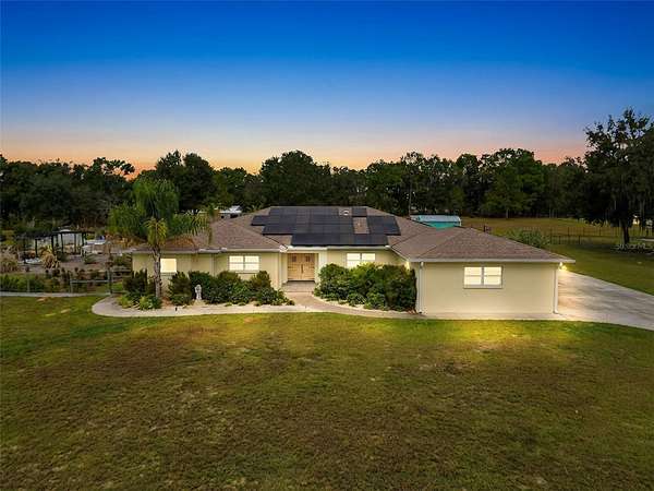 4.79 Acres of Land with Home for Sale in Floral City, Florida