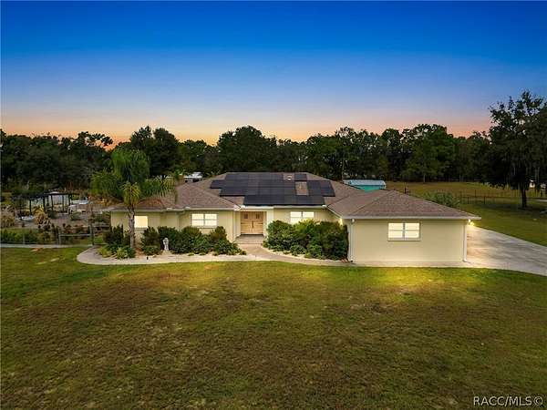4.79 Acres of Land with Home for Sale in Floral City, Florida