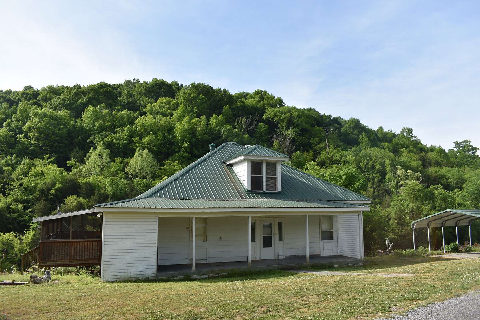 2.14 Acres of Land with Home for Auction in Chestnut Mound, Tennessee