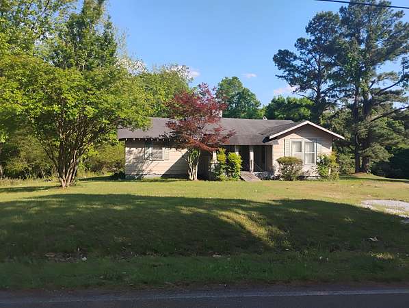 6.2 Acres of Land with Home for Sale in Eads, Tennessee